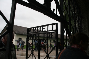 "Arbeit macht frei" is a German phrase meaning "work makes (you) free."